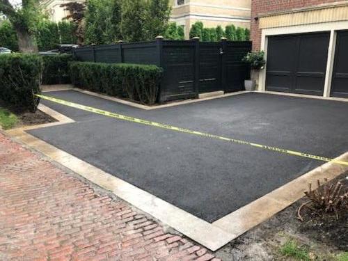 ASPHALT DRIVEWAY AND PARKING PAD WITH BANDING