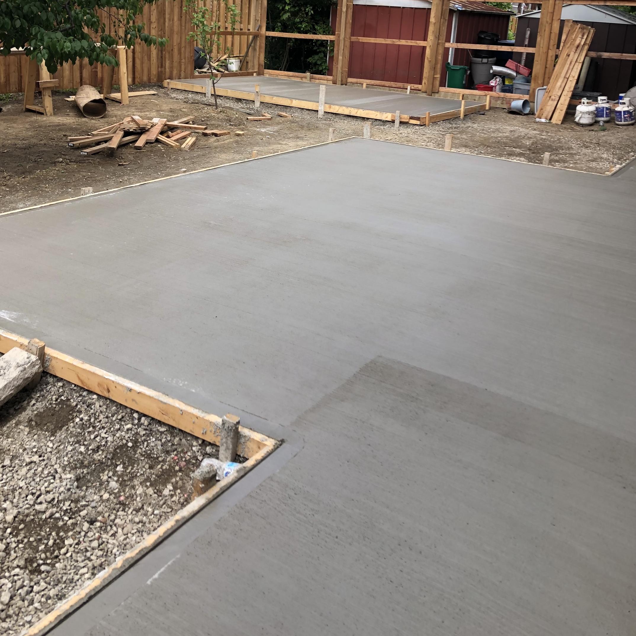 CONCRETE BACK PATIO WITH SHED FOUNDATION 